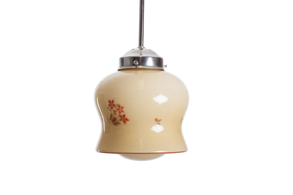 Krämfärgad glaskupa med brun och orange växtdekor. Vintage pendelkupa som kan monteras med pendel i nickel, krom, mässing eller textilkabel.