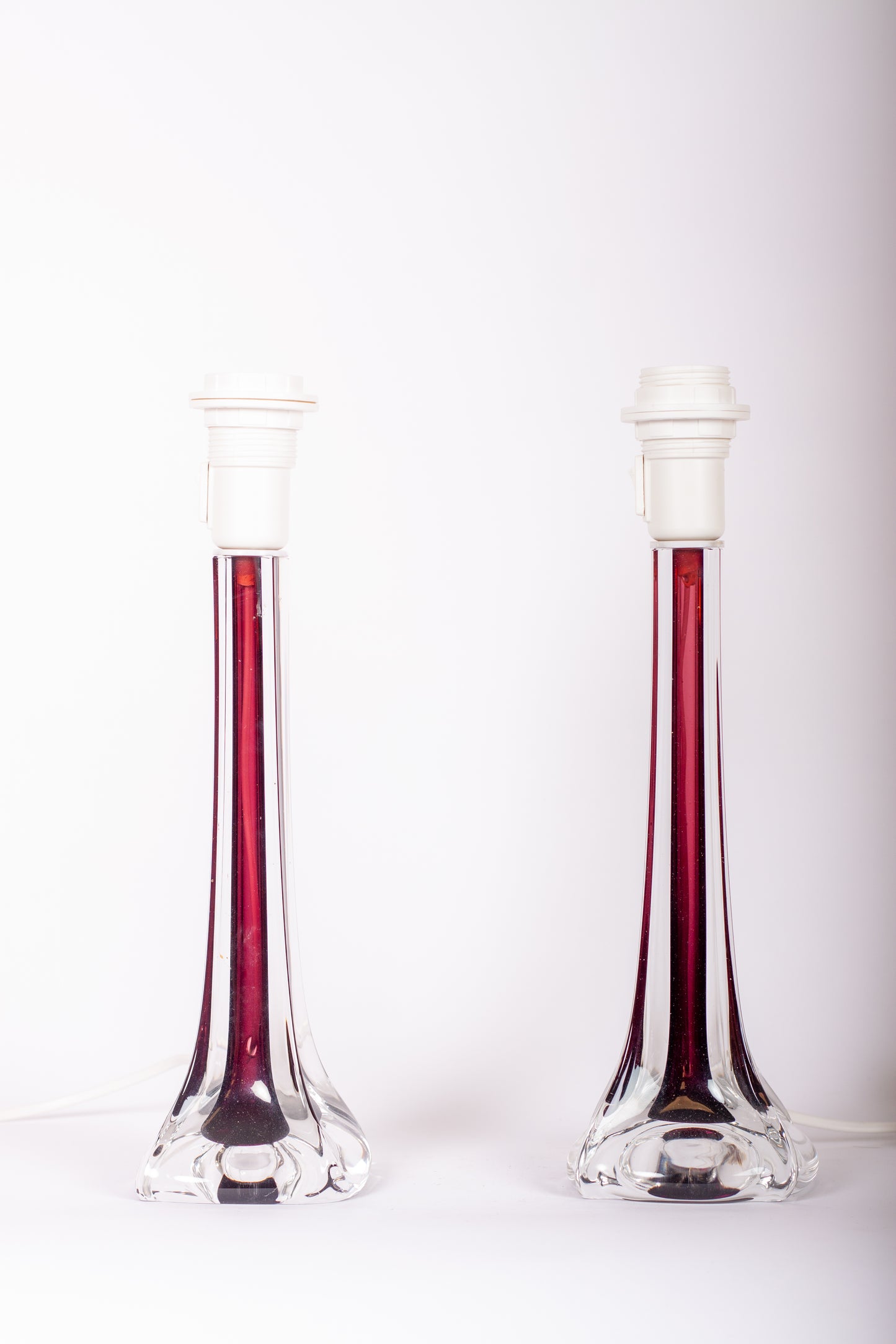 Flygors lampfötter i glas