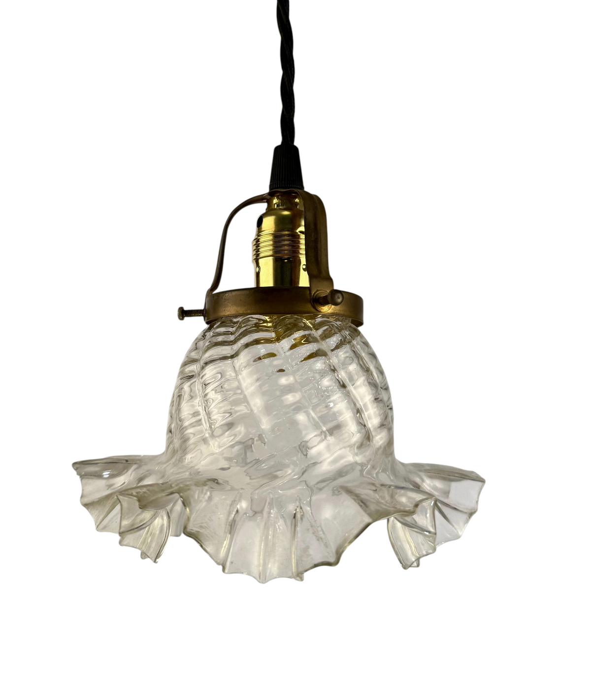 Modighus.se vintage fönsterlampa i klarglas med mässingsdetaljer och svart tvinnad kabel från 1960-talet.