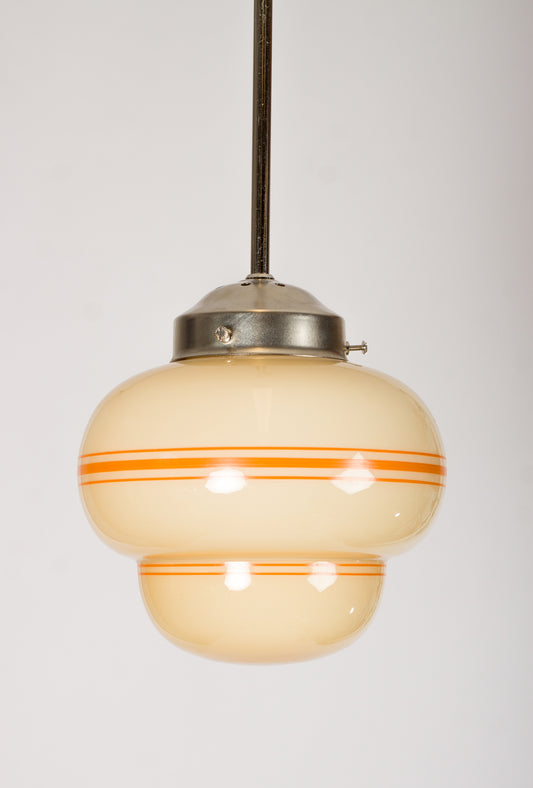 Retro glaskupa i kräm och gult med dekorränder i orange