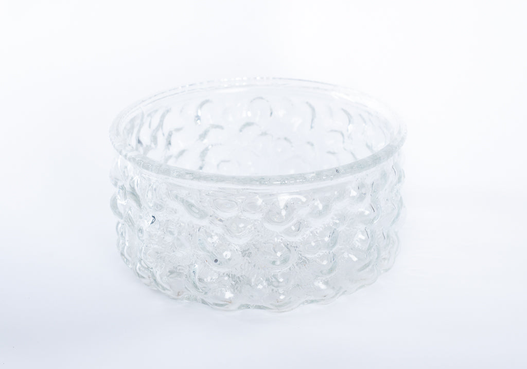 Glasskål med dekorativa bubblor
